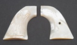 Extremely fine pair of two-piece, raised carved Mother of Pearl Grips for Colt SAA Revolver.  Right