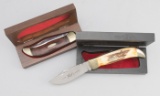 Collection of two Case Knives in their original wooden display boxes.  (1) One is titled 