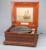 Beautiful antique Olympia Music Box in beautiful carved mahogany case, circa 1890-1900, plays 19 1/2