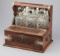 Elaborate, antique oak case Tantalus,(Liquor Bar), with German silver trim, three crystal Decanters