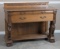 Fantastic antique, quarter sawn oak Credenza, circa 1900, with full carved winged griffin supports o