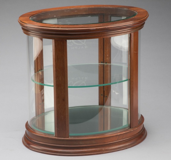 Unique oval, curved glass, counter top model Jewelry Case with beveled glass, see through top and pu