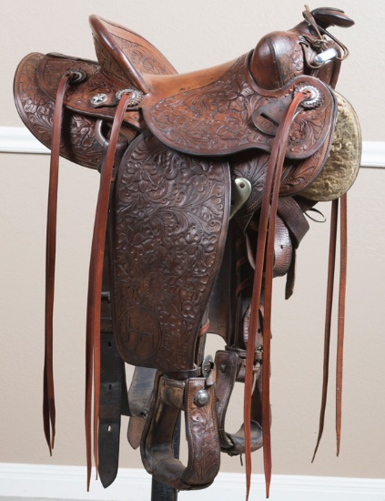 Rich Brown leather, floral tooled Saddle marked "H.H. Heiser, Denver", good condition, with Bar F Br
