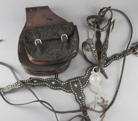 This  consists of three items to include: (1) Highly tooled pair of black Saddlebags. (2) Nickel sil