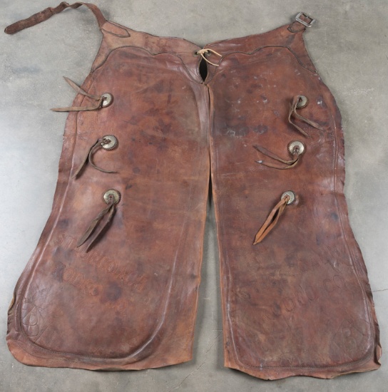 Pair of leather Bat Wing Chaps marked "Stage Coach Rodeo Co., Diamond B Brand", three conchos with l