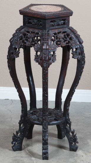 Heavily carved Teakwood Pedestal with inlaid marble top, 32" T x 12" hexagon top.  Hardesty Estate.