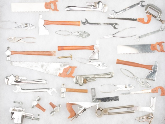 Collection of 30 miniature Tools, most all are marked "Marx", sold in a glass front Racker mount.  H