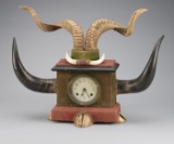 An original vintage Horn Clock from the Buckhorn Saloon, San Antonio, Texas.  This mantle clock has