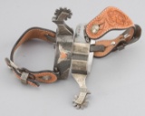 Beautiful pair of double mounted Spurs by noted Texas Artist, Pat Ray Castleberry, heel bands are en