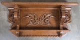 Extremely high quality American antique solid oak Wall Shelf, circa 1910, with deep carved oak leaf
