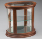 Unique oval, curved glass, counter top model Jewelry Case with beveled glass, see through top and pu