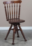 Most unusual antique, swivel mahogany Piano Stool, circa 1910, with twisted legs and unusual stretch