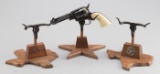 Group of three custom made, 2-piece Revolver Stands, solid walnut with cast iron long horn holders,