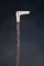 Ornate antique Cane with wooden shaft and carved dog head handle, measures 36 1/2