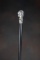 Antique Cane with wooded shaft, has spelter handle shaped bust marked 
