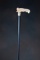 Antique Cane with ebony shaft and steel point, mounted with engraved gold and ivory handle, measures