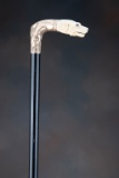 Fancy antique Cane with wooden shaft, mounted with engraved gold and ivory handle of a dogs head wit
