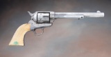 Handsome antique Colt Single Action Army Revolver, .45 caliber with checkered ivory grips. SN 104040