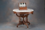 Beautiful walnut Victorian oval Parlor / Lamp Table, circa 1870, with beautiful turned stretcher bas