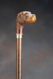 Wooden Dog's Head Cane with carved dogs head with glass eyes. 32