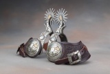 Outstanding pair of double mounted, hand engraved silver overlay Spurs by noted Texas Bit and Spur M