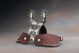 A pair of single mounted silver overlay Spurs by the late  Bit and Spur Maker Carl Hall, Comanche, T