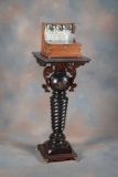 Early Victorian mahogany Pedestal with revolving stick and ball top, circa 1890-1900, brass claw fee