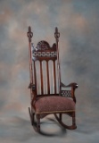 Extremely unique, antique mahogany Arm Rocker, circa 1900-1910, with carved Granny Face in back and
