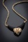 A 14 Kt. Yellow gold 5mm 18 inch Rope Chain and an onyx carved piece set with an elephant head in go