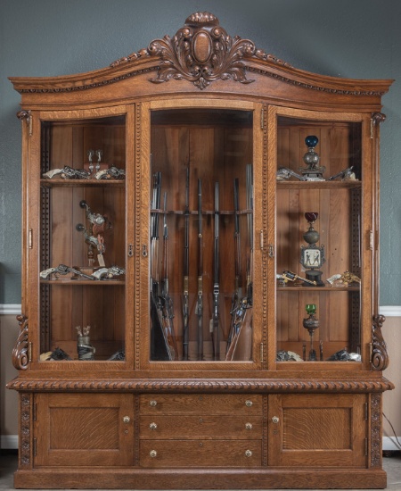Monumental, antique oak, triple door, 2-piece Gun Cabinet, circa 1890-1900, all beveled glass with l