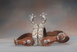 A pair of double mounted Spurs by Texas Bit and Spur Maker Kevin Burns in floral and heart pattern o
