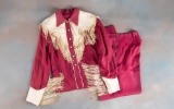 Vintage, two piece ladies, maroon and cream color Rodeo Shirt and Pants, with fringe and pearl butto