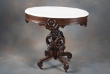 An outstanding and most unique, antique rosewood, oval top, marble top Parlor Table, circa 1870, wit