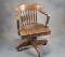 Antique barrel back oak, swivel Office Chair, nice finish and condition, circa 1920s with 32