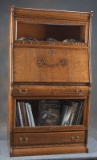 Unique antique oak, stacking Lawyer Bookcase, circa 1910,  with slant front desk center section.  De