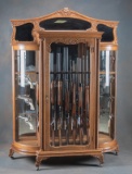 Beautiful antique curved glass Rifle & Handgun Display Case, with ornate beveled triple mirrored cre