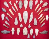 Group of approximately 40 pieces of Arrowheads, Flint and Drills in glass front case.  LEO BRADSHAW