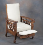 Antique oak, lion head Morris Chair with claw feet, circa 1900-1910, with adjustable back and pull o