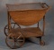 Scarce antique quarter sawn oak, Big Wheel Tea Cart with lift off glass tray and double drop leaf si