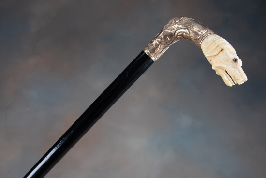 Fine antique Walking Cane with ebony shaft, circa 1890s, with ornate embossed gold handle with ivory