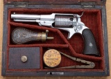 Antique cased Remington-Beals, 3rd Model Pocket Revolver, SN 75, which can be found under the lever.