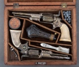 Cased Gustave Young engraved pair of Colt, Model 1855, No. 5 Model 