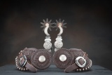 Pair of double mounted Spurs in crescent and peacock pattern by the late Austin, Texas Bit and Spur