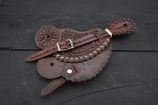 A pair of unused spotted two piece Spur Straps, basket weave pattern by the late Saddle Maker Buddie