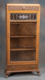 Fancy, American antique, quarter sawn oak, single door Bookcase, circa 1900-1910, with carved crest