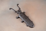 A vintage cast iron Beetle Bug Boot Jack in original aged patina, 12 1/2