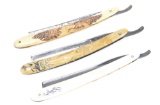 Collection of three vintage Straight Razors.  One has an embossed nude on handle, one has embossed s