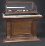 Antique oak, granite top Pedestal, circa 1900-1910, full width storage compartment with door in rear