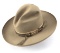 This  consists of two vintage Western Hats.  The light colored hat is marked inside on leather sweat