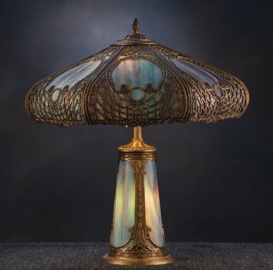 A beautiful antique curved glass, stained glass Table Lamp, circa 1920-1925, attributed to The Mille